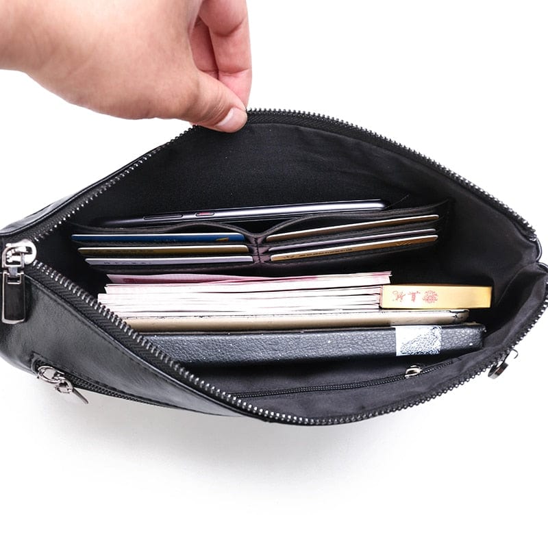 Best Selling Leather Pouch Case Bag for Men and Women. This handmade luxury design brand leather pouch is the perfect solution for business and travel use. The pouch is made from 100% real leather, providing a high-quality and durable solution for your mobile, iPad, and MacBook.